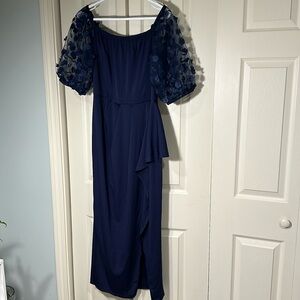 Blue dress for wedding guest with floral detail sleeve